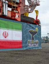 A banner with Iran’s flag is seen on a shipping container at Terminal 46 in Seattle.
