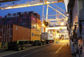 Semi-truck carrying containers
